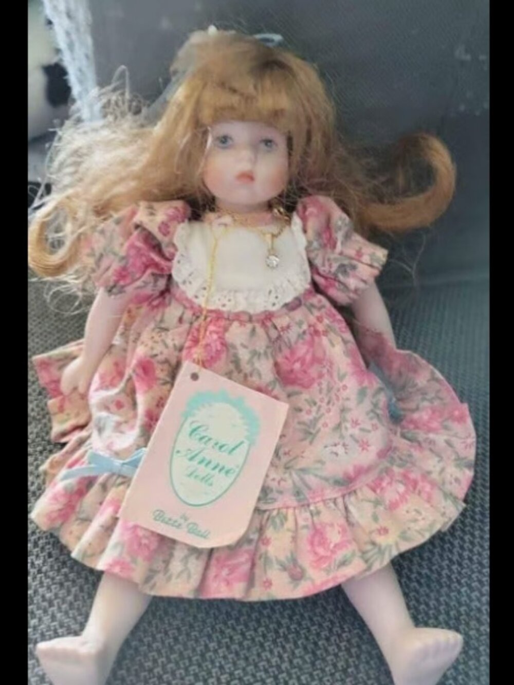 Carol Anne dolls. April birthday necklace